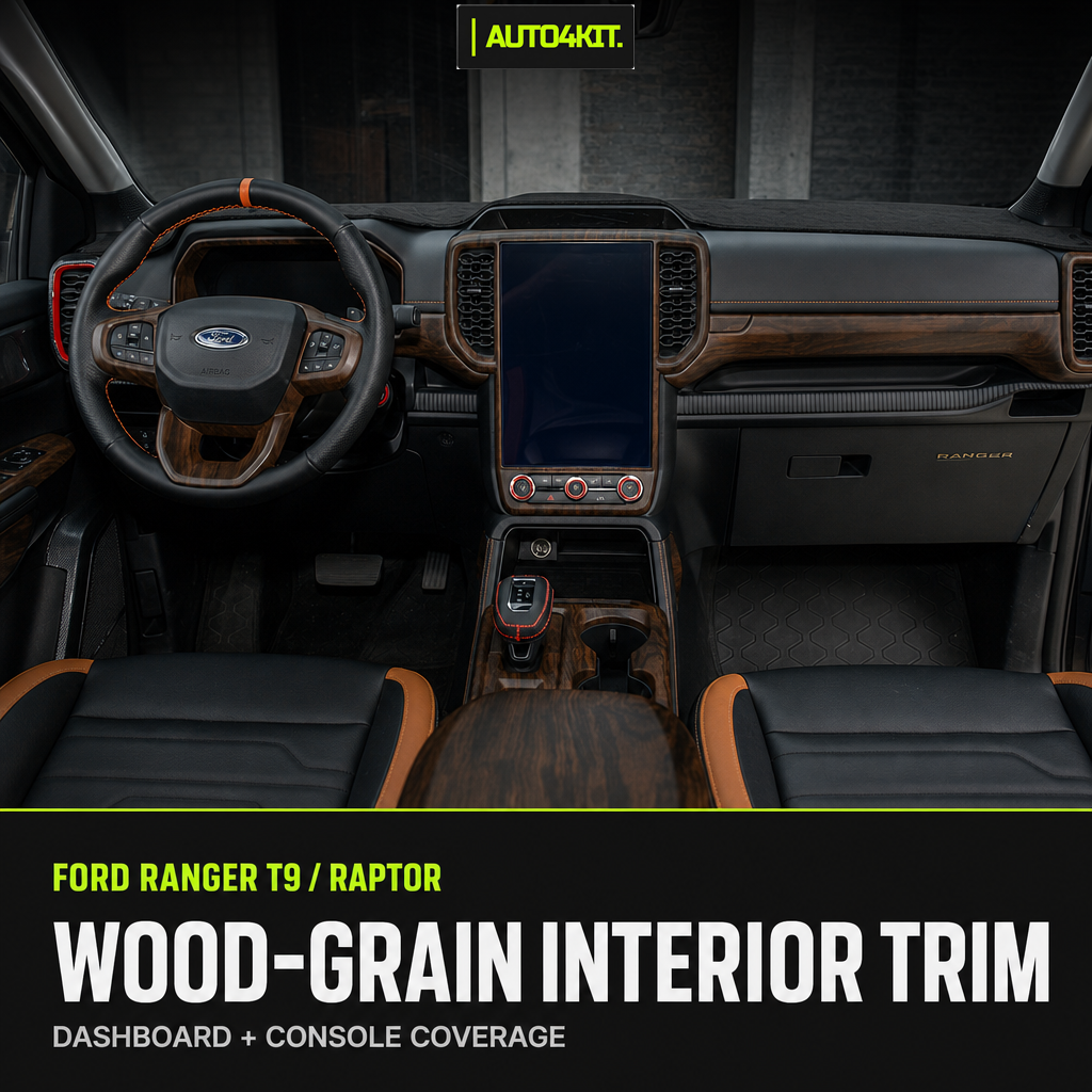 Ford Ranger cabin overview showing wood-grain dashboard, steering-wheel and console trim